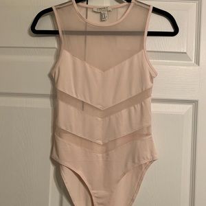 Light pink bodysuit top.